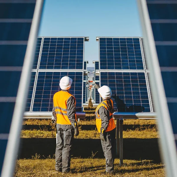 two solar energy workers