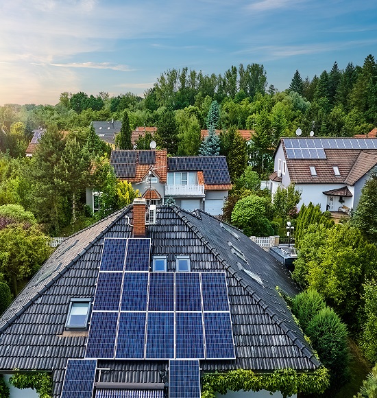 Residential neighborhood with multiply houses powered by solar panels