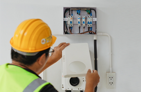 Technician finalizing EV Charger installation